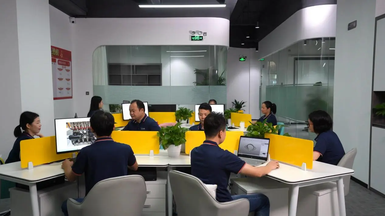 "Precimach engineering team at work, providing one-stop CNC machining solutions including milling, turning, and precision finishing"